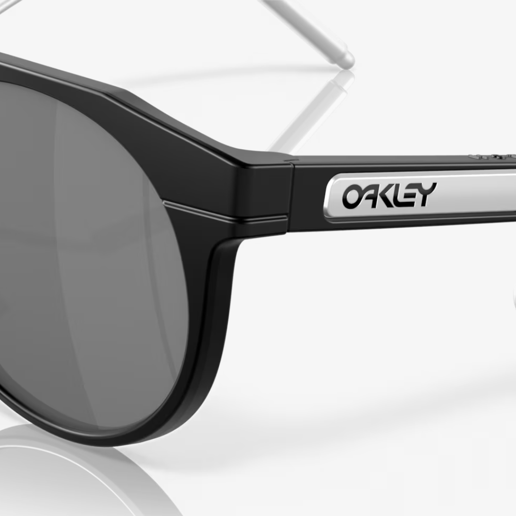 OAKLEY saulesbrilles HSTN Metal matētas melnas ar Prizm Black lēcām