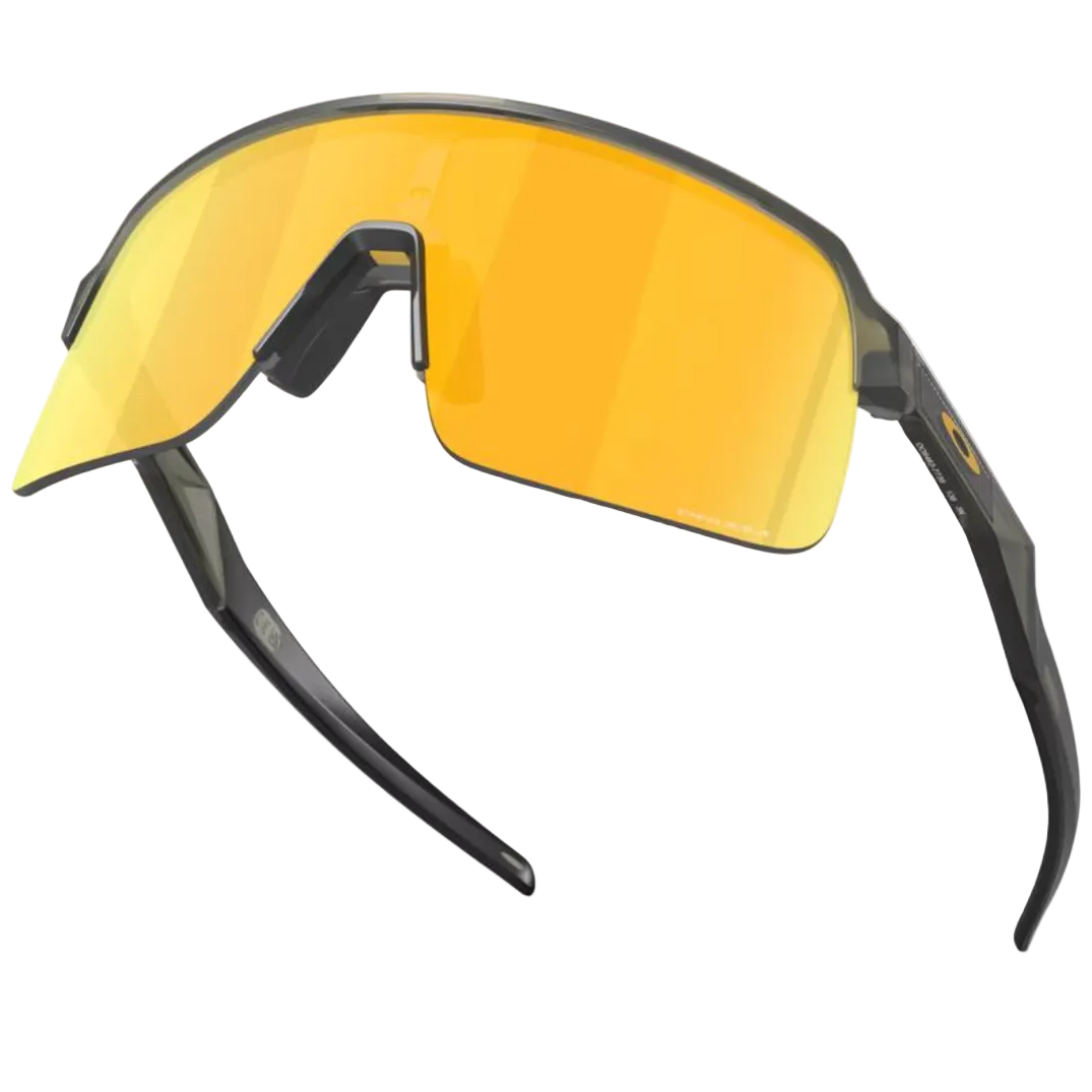 Sunglasses with yellow lenses and black frames on a white background