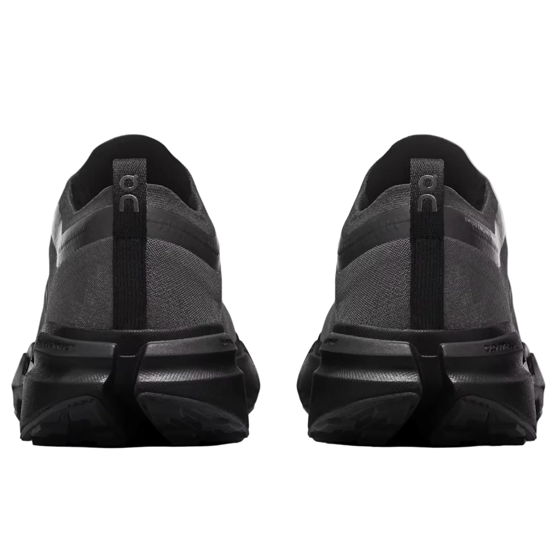 Black athletic shoes on a light gray background
