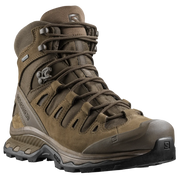 Brown hiking boot with brand logo on a white background