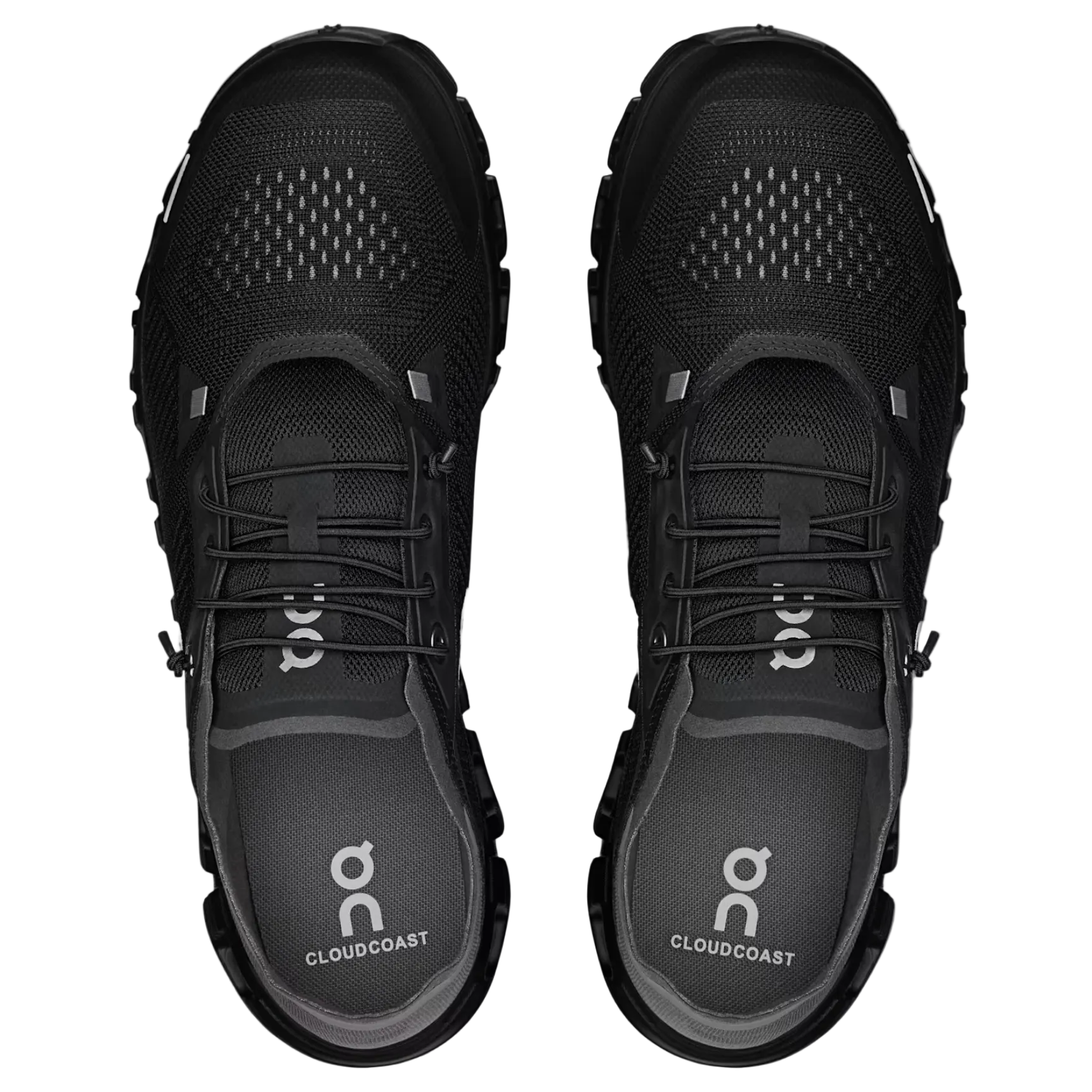 Black athletic shoes with 'on' branding on a light gray background