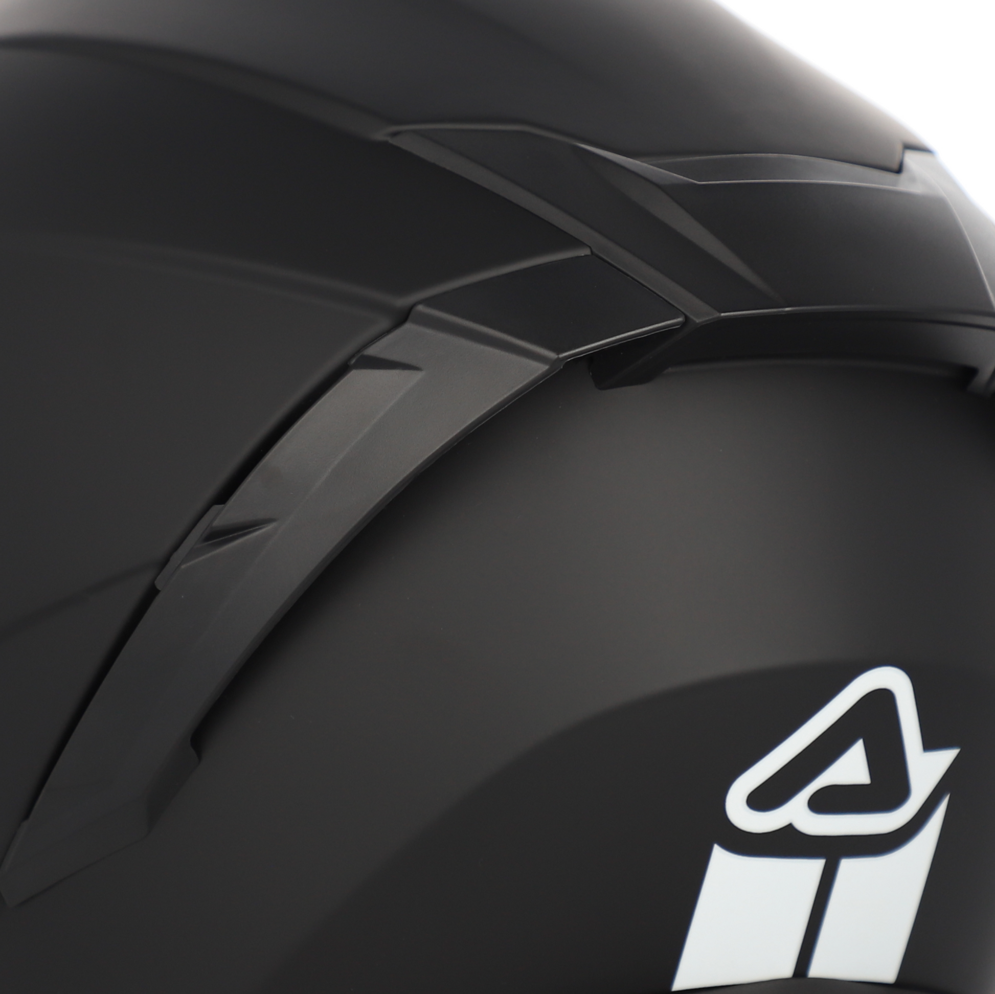 Black motorcycle helmet with a logo on a white background
