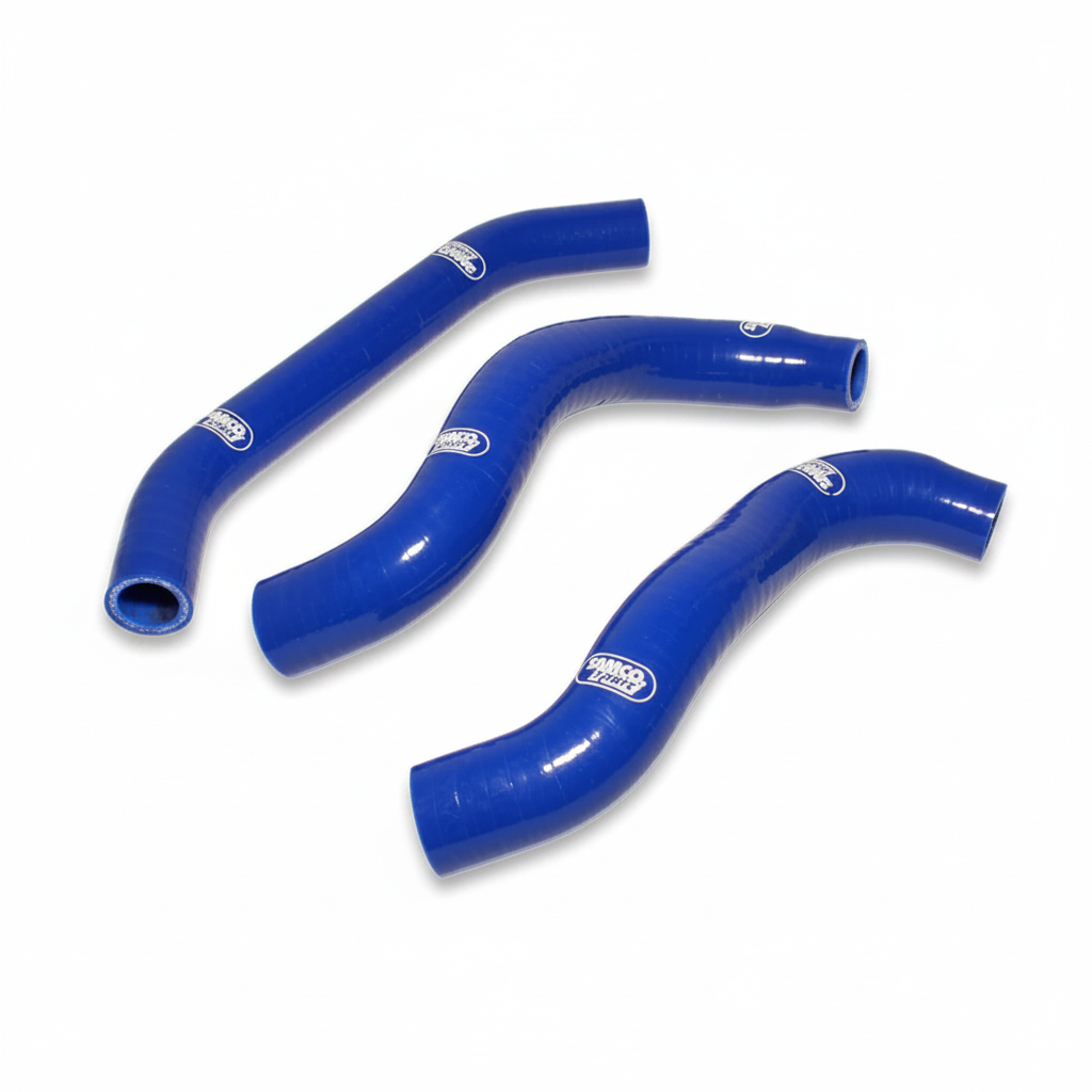 Three blue silicone radiator hoses on a white background