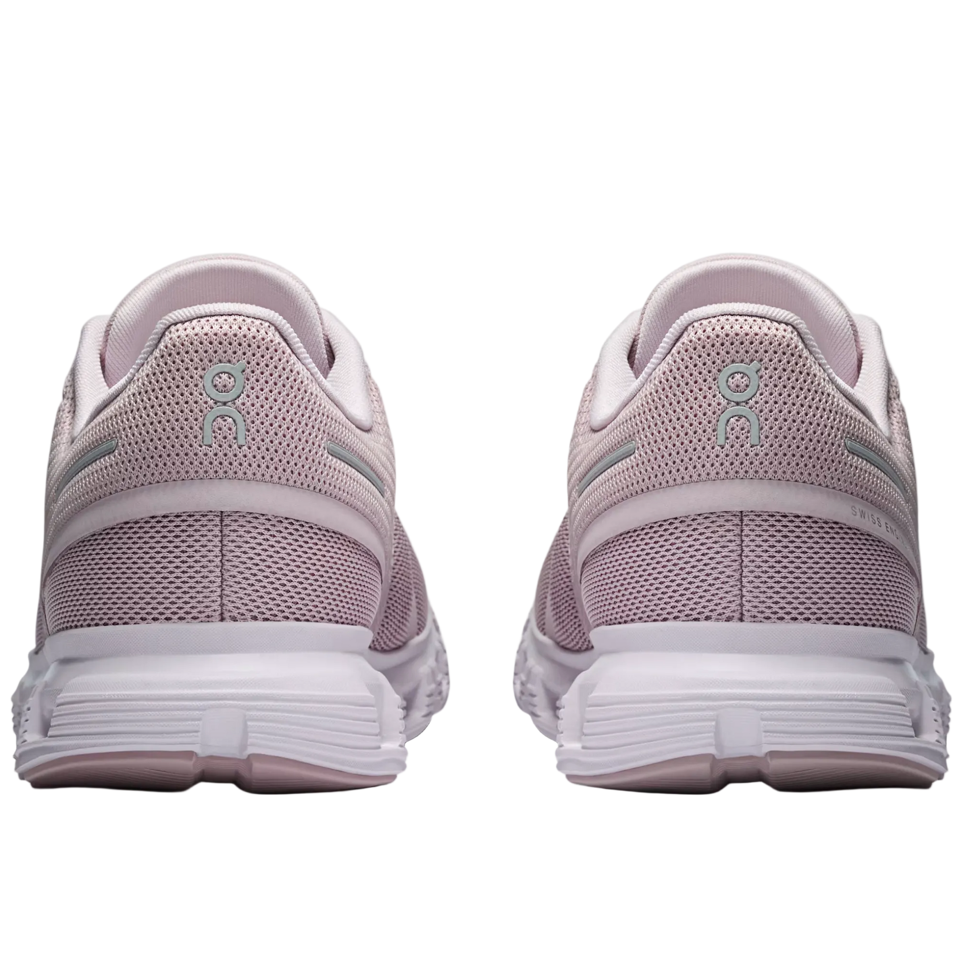 Pair of light purple running shoes with white soles on a light gray background