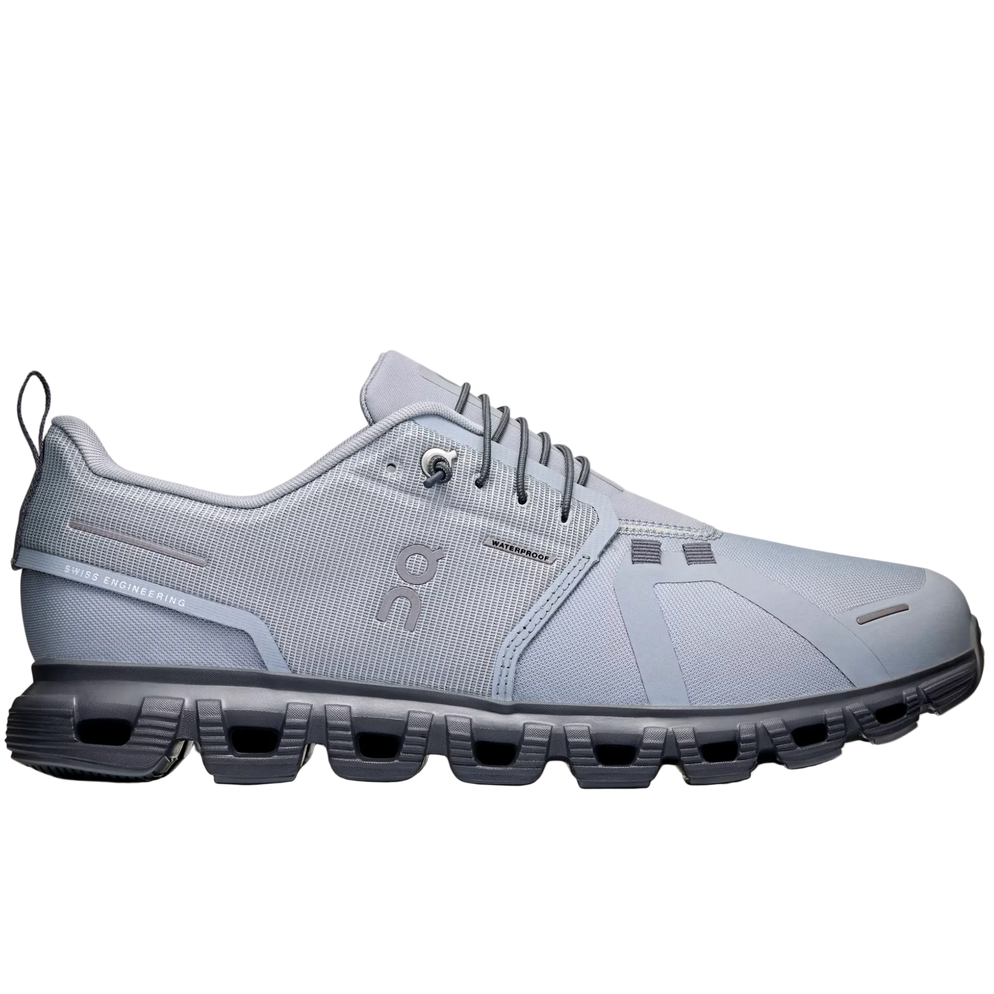 Gray athletic shoe with unique sole design on a light gray background