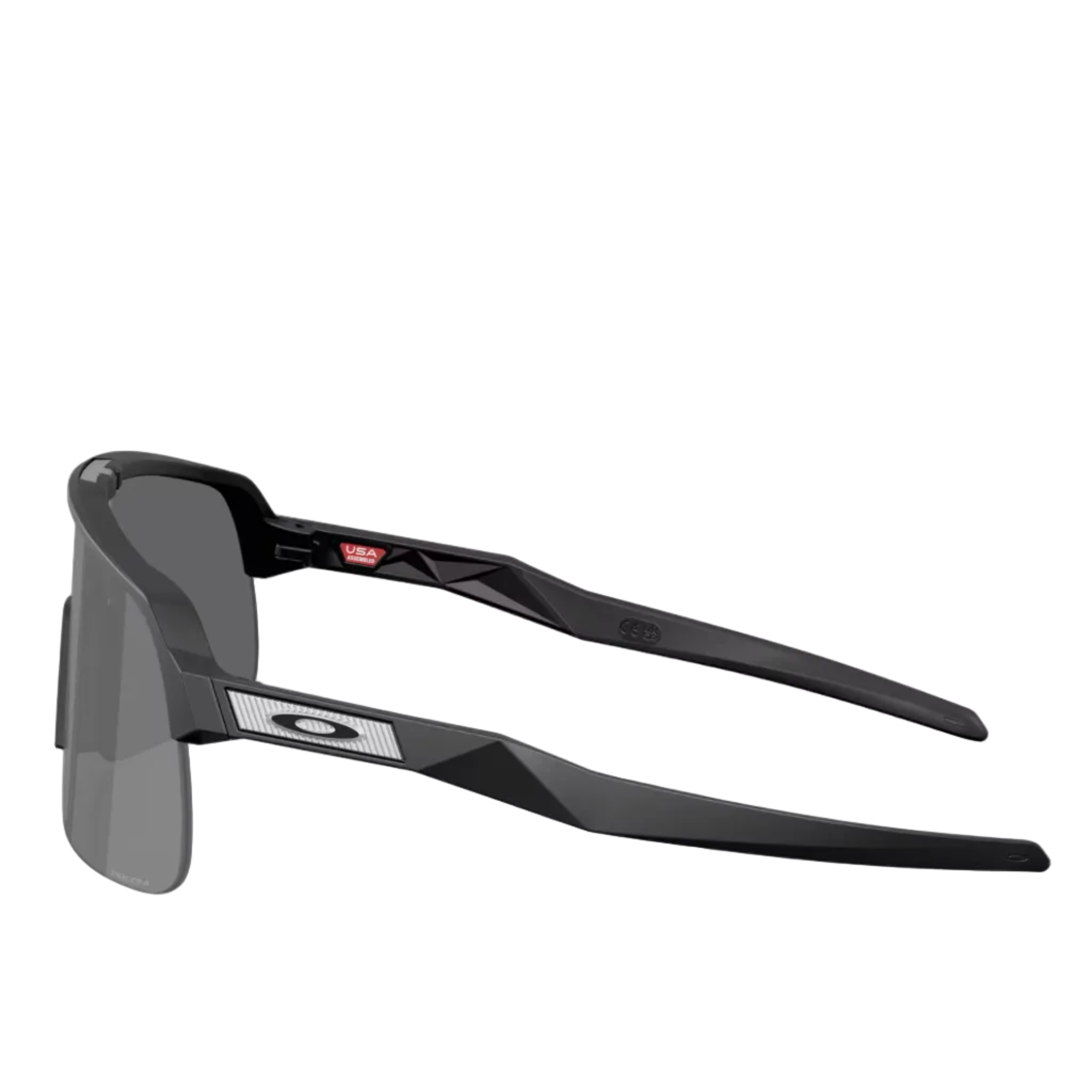 Oakley wraparound sunglasses with a matte black frame and dark gray lenses, shown from a three-quarters angle on a light gray reflective surface.