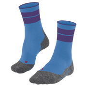A pair of athletic crew socks in light blue with dark purple stripes near the cuff and heather gray heels, toes, and soles, shown on a plain white background.