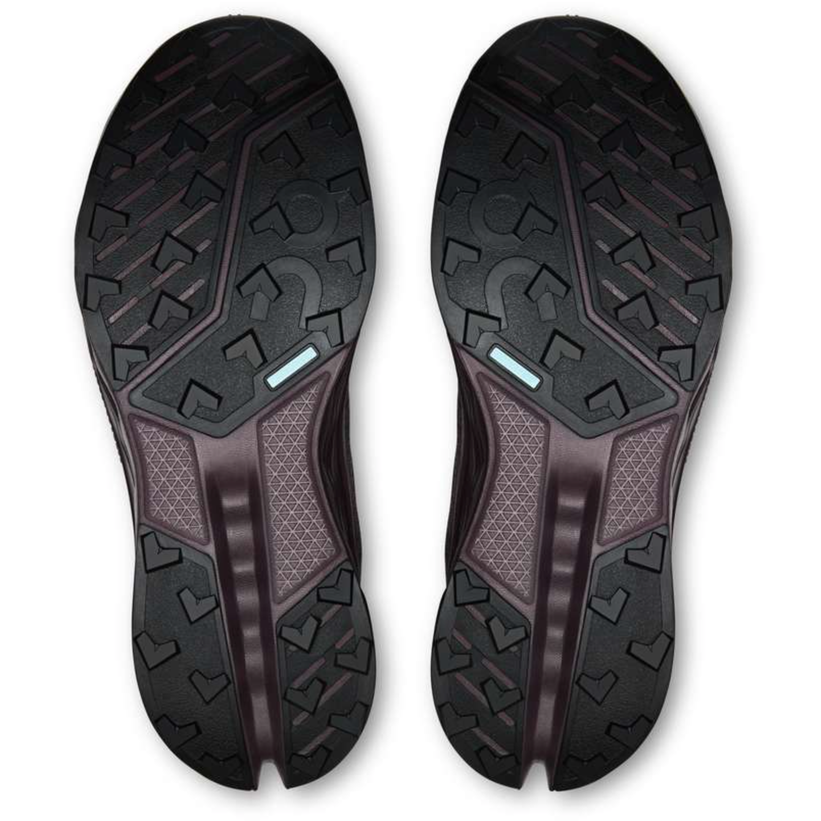 A pair of black athletic shoes shown from the sole view, displaying their textured tread patterns and dark purple inner lining details against a white background.