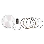 A piston ring kit laid out on a clean white background, including a shiny silver piston head, a dark metal rod, two small clips, and several piston rings in dark gray and bronze tones.